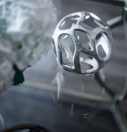 Decorative spherical object with intricate design.