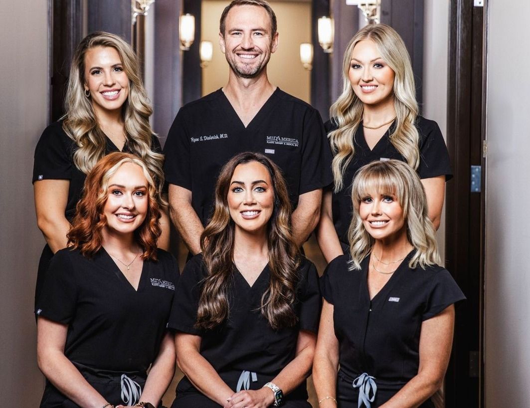 Medical professionals posing for a group photo.