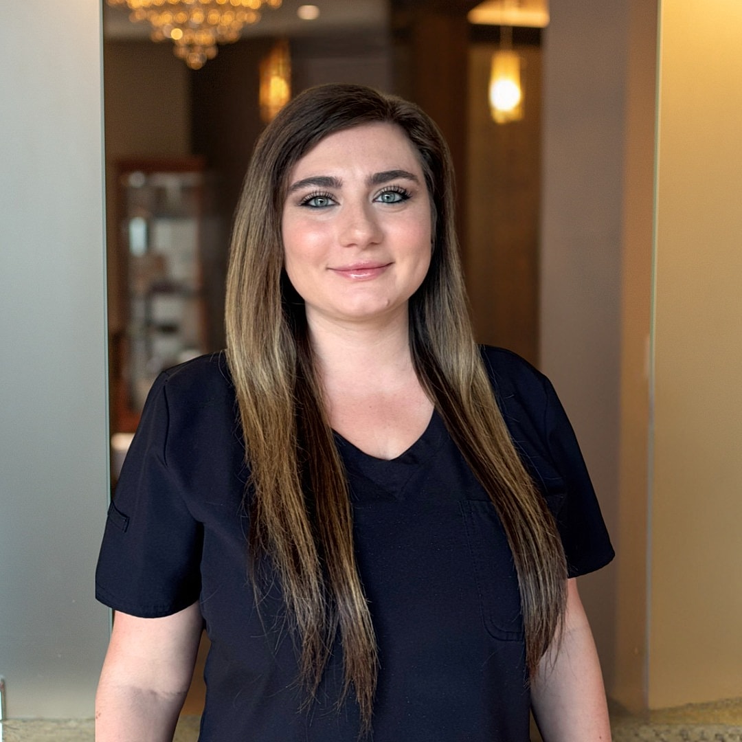Modern waiting area with black chairs and decor
