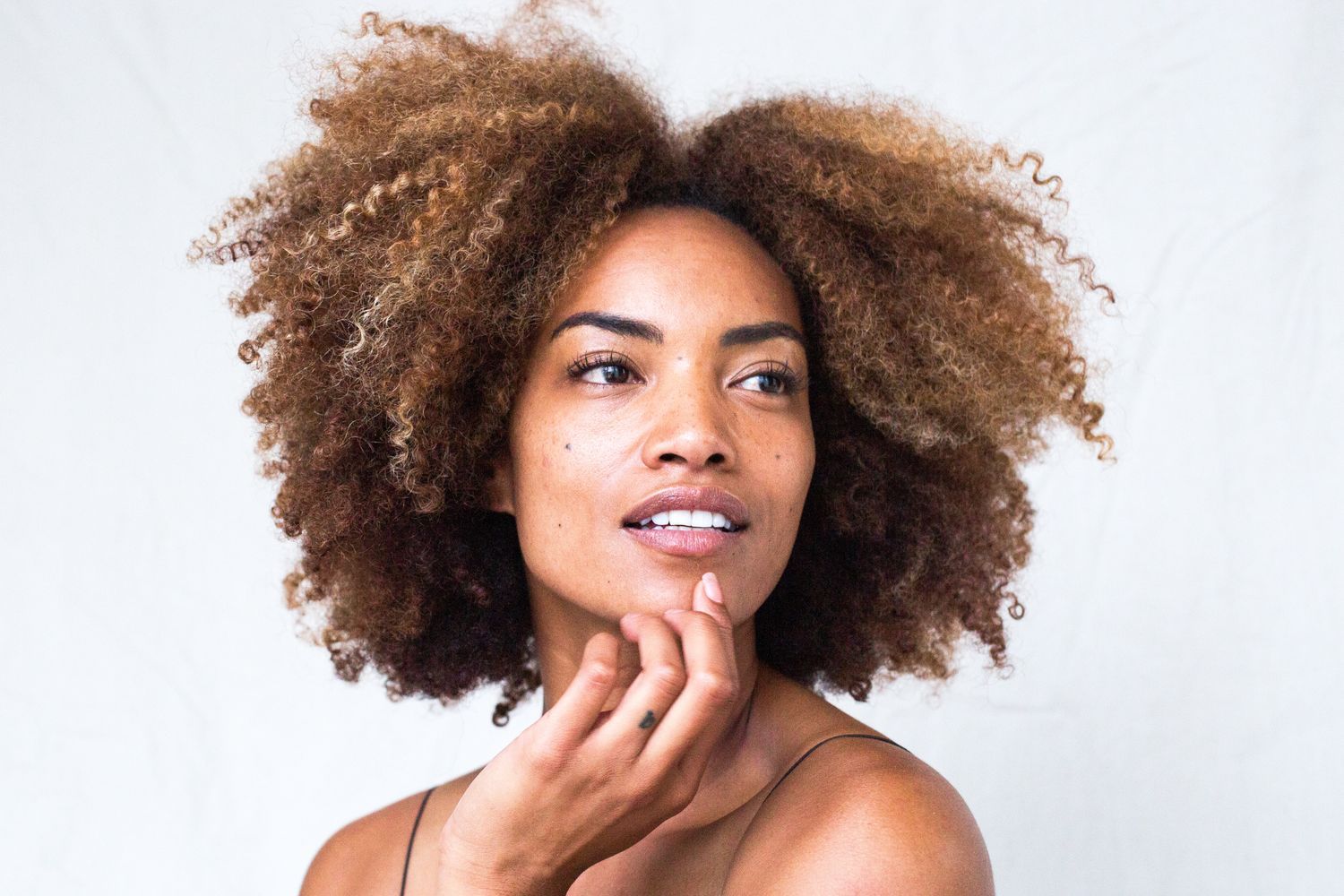 Skincare products with a stainless steel bowl.